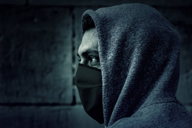 istock Young street gang with mask 1322616431