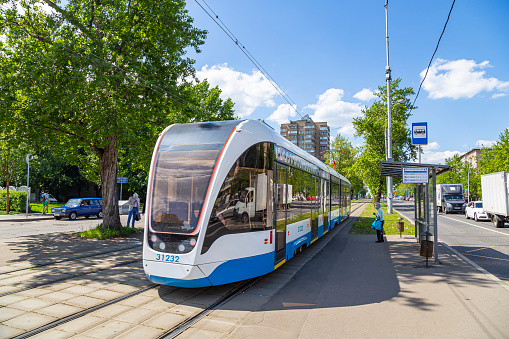 MOSCOW, RUSSIA- MAY 26, 2021:Modern tram (urban electric transport ) on a Moscow street (central district)