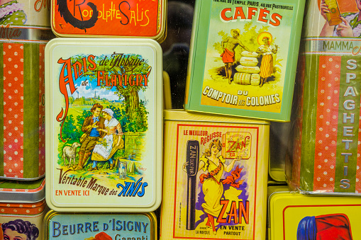 The City of Paris France on March 29, 2014:  Gift shop window displaying heritage gift tins in Paris France