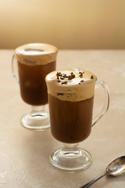 istock Coffee and milk. Delicious coffee drink with ice cream 1322627128