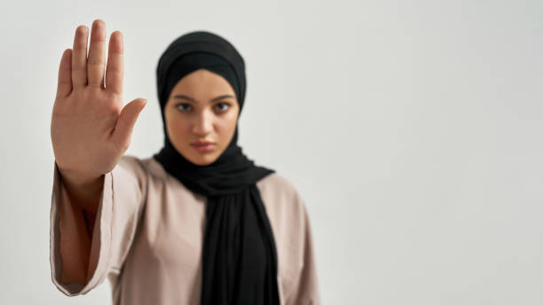 istock Selective focus on stop gesture shown by woman 1322628983