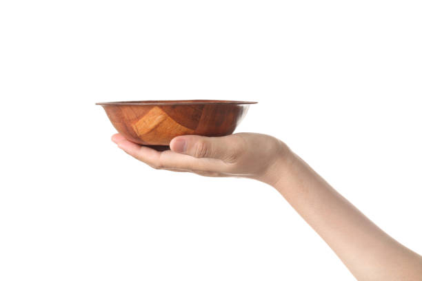 istock Chef holding wooden cup isolated on white background 1322630138