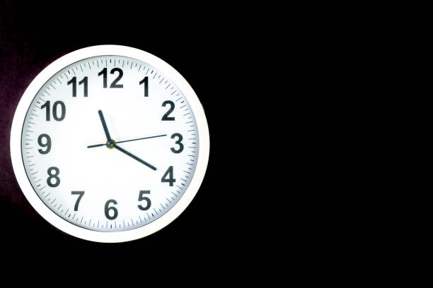 wall clock with numerals on the clock face with copy space - macro hour hand minute hand accuracy imagens e fotografias de stock