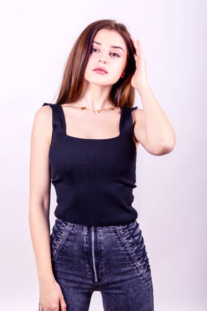 istock woman with modern clothes shoot in the studio white background 1322633286