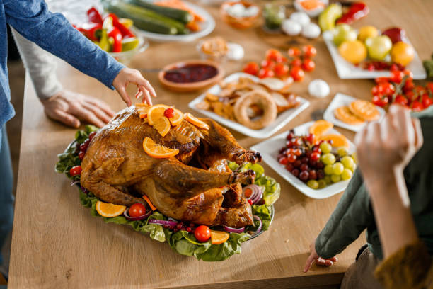 istock Stuffed Thanksgiving turkey on dining table. 1322633508