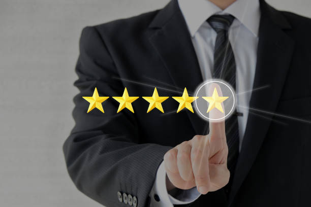 istock Business man and 5 stars evaluation 1322639161