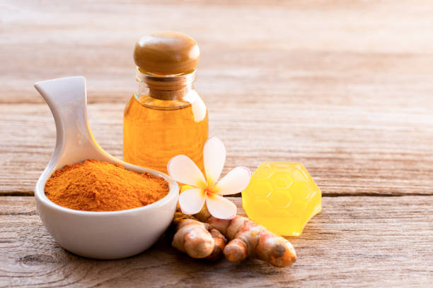istock Turmeric powder and tumeric oil 1322640376