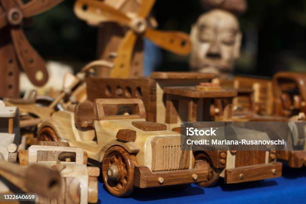 Wood Carving Exhibition Of Professionally Carved Cars Trucks For Children Toys Stock Photo - Download Image Now