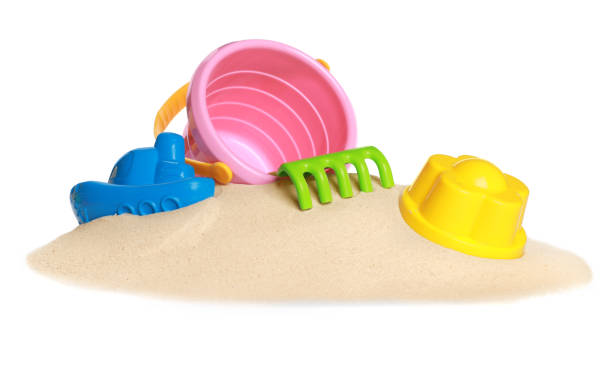 istock Colorful beach toy set with sand isolated on white 1322640991