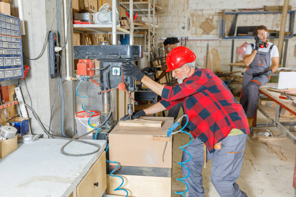 istock Multi-Ethnic Group of Carpenters is Working in a Spacious Manufacture Workshop. 1322641912