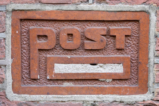 istock Old Closed Stone Post Box At Amsterdam The Netherlands 1322642568