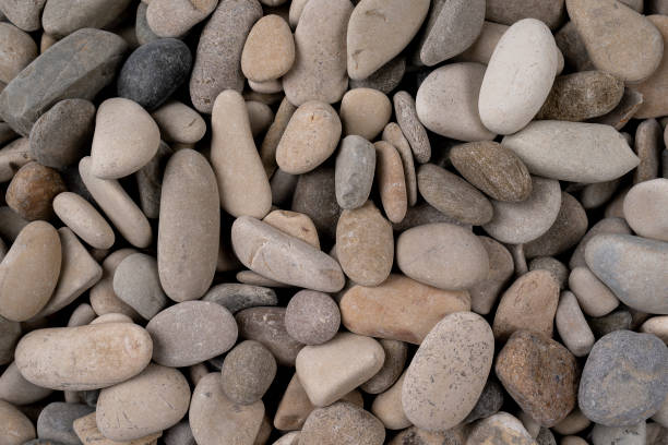 istock Abstract background with pebbles round sea stones 1322644409