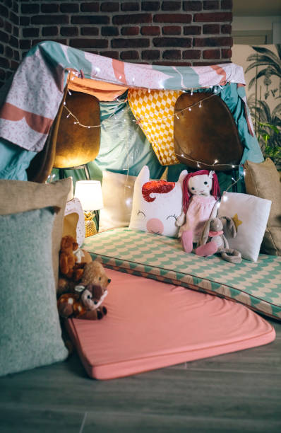 istock Makeshift kids tent made with chairs and sheets 1322646088