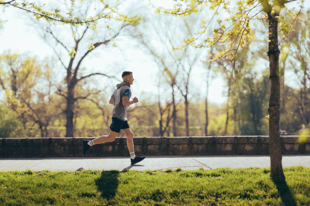 istock Young Athlete Running Alone in Nature 1322647539