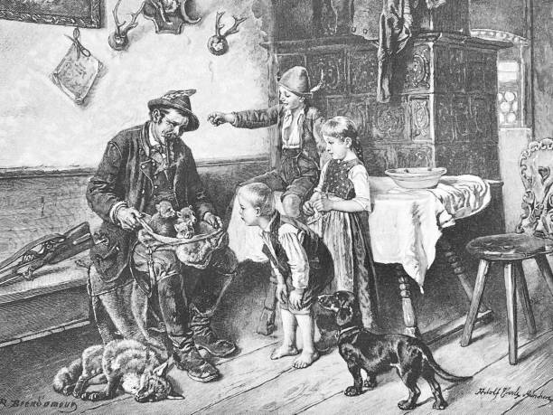 istock Hunter shows his children 3 little foxes at the kitchen stove 1322654421