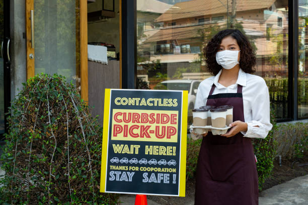 Curbside pick up for stay safe for social distance. Curbside pick up for stay safe for social distance. Coffee shop prepare for customer. curb photos stock pictures, royalty-free photos & images