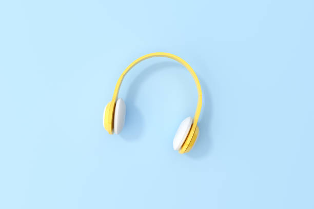 istock Mockup scene of yellow headphone on blue background. Minimal conceptual idea, 3d rendering. 1322659852