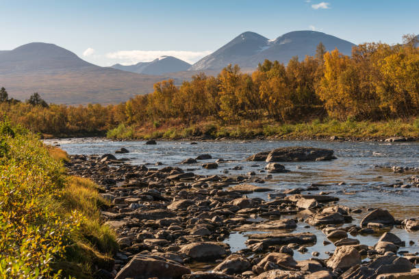 Landscape with Abisko river and mountains, Norrbotten, Sweden Autumn landscape with Abisko river and mountains. Northern Sweden norrbotten province stock pictures, royalty-free photos & images