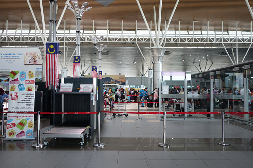 Kota Kinabalu, Malaysia- Jun 22, 2017: Passengers checking in the boarding hall in the Kota Kinabalu International Airport, Sabah, Malaysia.