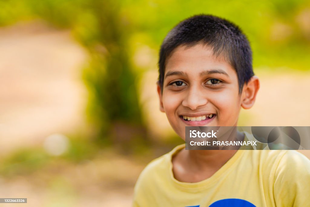Cute Indian child studying at home. Boys Stock Photo