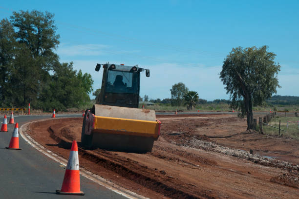 Road maintenance equipment working on rural road