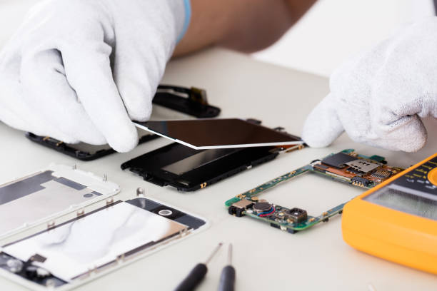 istock Person Fixing Damaged Screen On Mobile Phone 1322665870