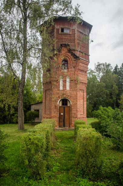 istock Old red brick and wood water tower, Spare, Latvia 1322666706