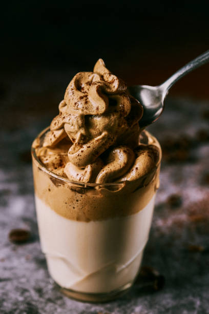 istock takes a spoon of dalgona coffee 1322666826