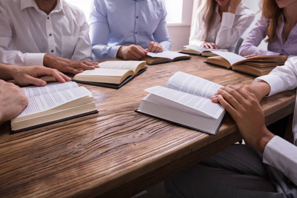 istock Group Of People Reading Bible 1322670971