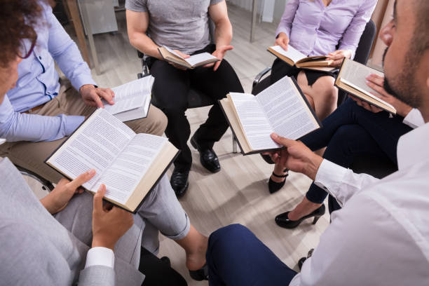 istock Group Of People Reading Holy Books 1322671049