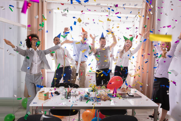 istock Excited Businesspeople Having Fun Raising Their Arms 1322671695