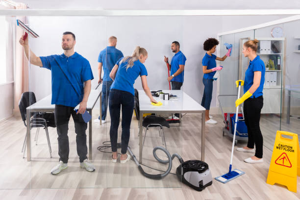 istock Group Of Skilled Janitors Cleaning Office 1322671872