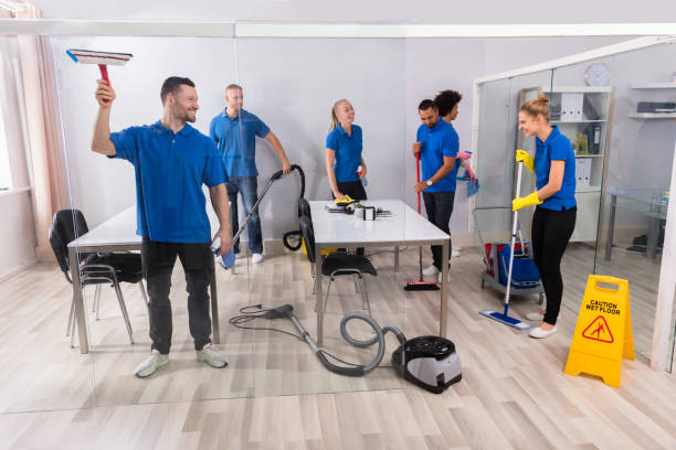 istock Group Of Skilled Janitors Cleaning Office 1322671889