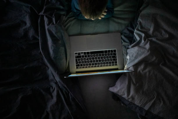 istock Kid watching cartoons on laptop 1322673140