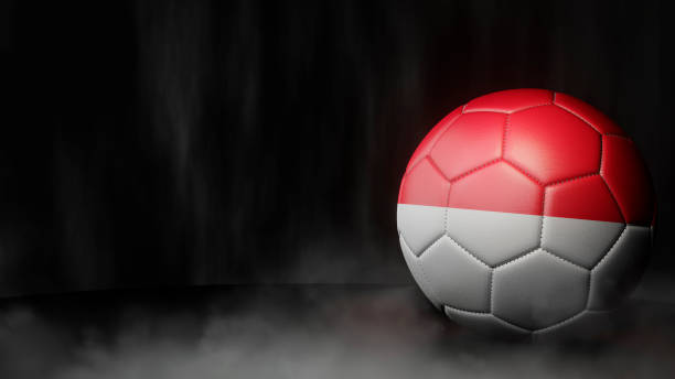 soccer ball in flag colors on a dark abstract background. indonesia. - indonesia football stok fotoğraflar ve resimler