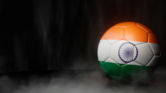 Soccer ball in flag colors on a dark abstract background. India. 3D image.