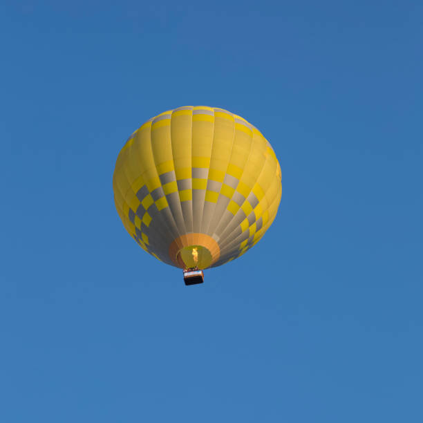 istock Hot air balloon flying on sky 1322676377