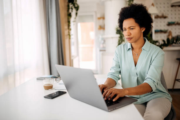 istock Hispanic business woman working from home 1322679465