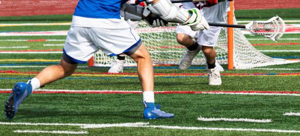 istock Lacrosse player taking a shot on goal 1322679591