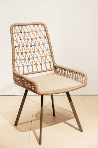 istock Cozy stylish wicker garden chair 1322679897