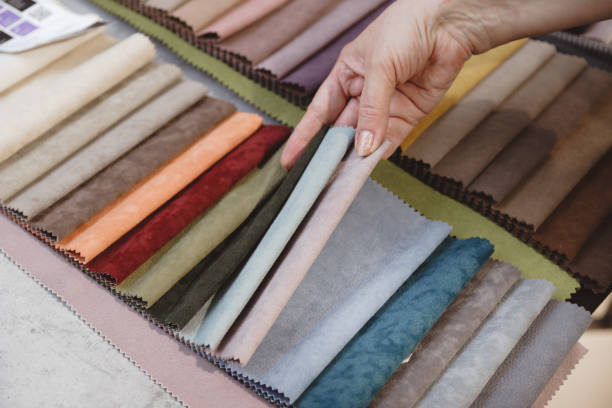 istock Hand pick the colorful upholstery samples in the shop 1322679984