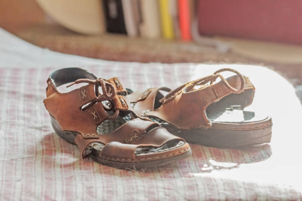 istock Real brown old women's sandals 1322682440