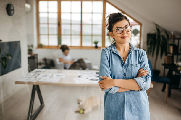istock Young female graphic designer posing at her new office setup 1322682454