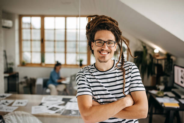 istock Portrait of confident graphic designer in home office setup 1322682693
