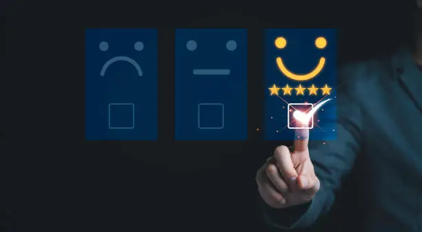 Photo of Businessman  touch on virtual tab bar to customer evaluates products and services. Customer satisfaction and marketing survey rating concept.