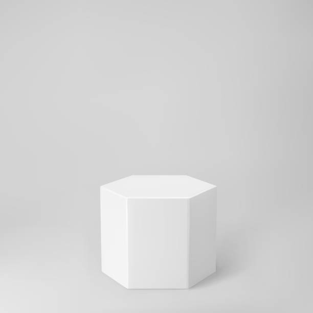 istock White 3d hexagon podium with perspective isolated on grey background. Product podium mockup in hexagon shape, pillar, empty museum stage or pedestal. 3d basic geometric shape vector illustration 1322683277