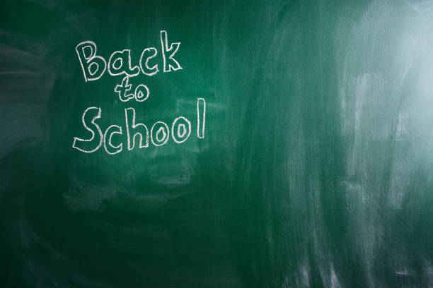 Back to school background with text written of chalk with copy space Back to school background with text written of chalk on green balckboard with copy space. School concept. Mockup back to school photos stock pictures, royalty-free photos & images