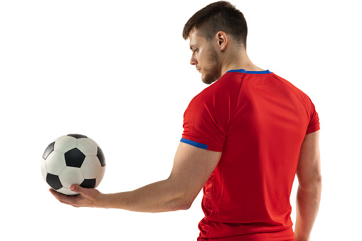 Football/Soccer fan wearing green with ball