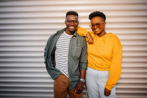 istock Portrait of two smiling couple 1322685810