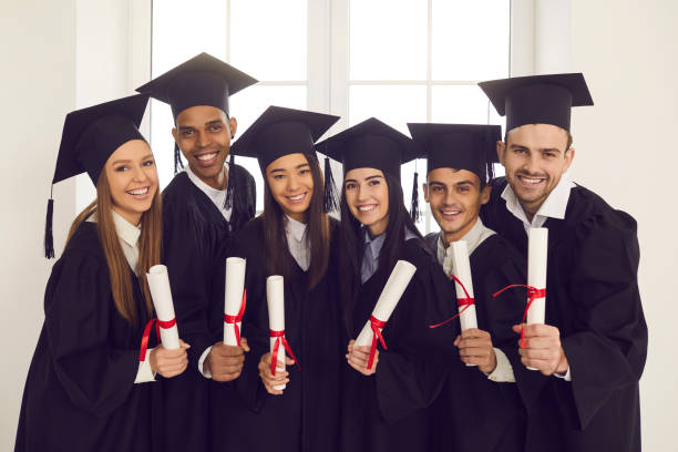 istock Successful graduation from college or university of mixed race group 1322686311